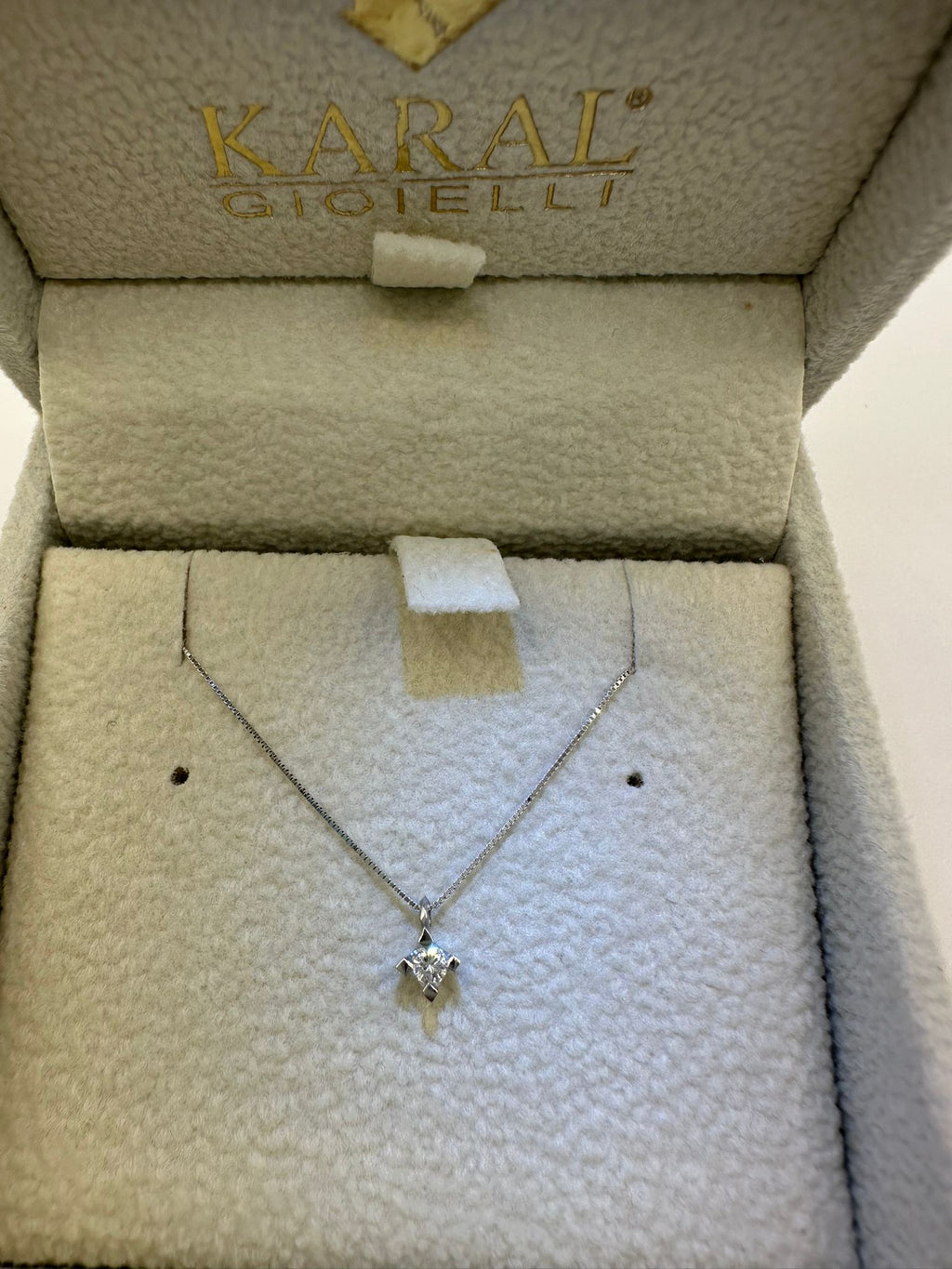 punto luce in oro con diamante - karal