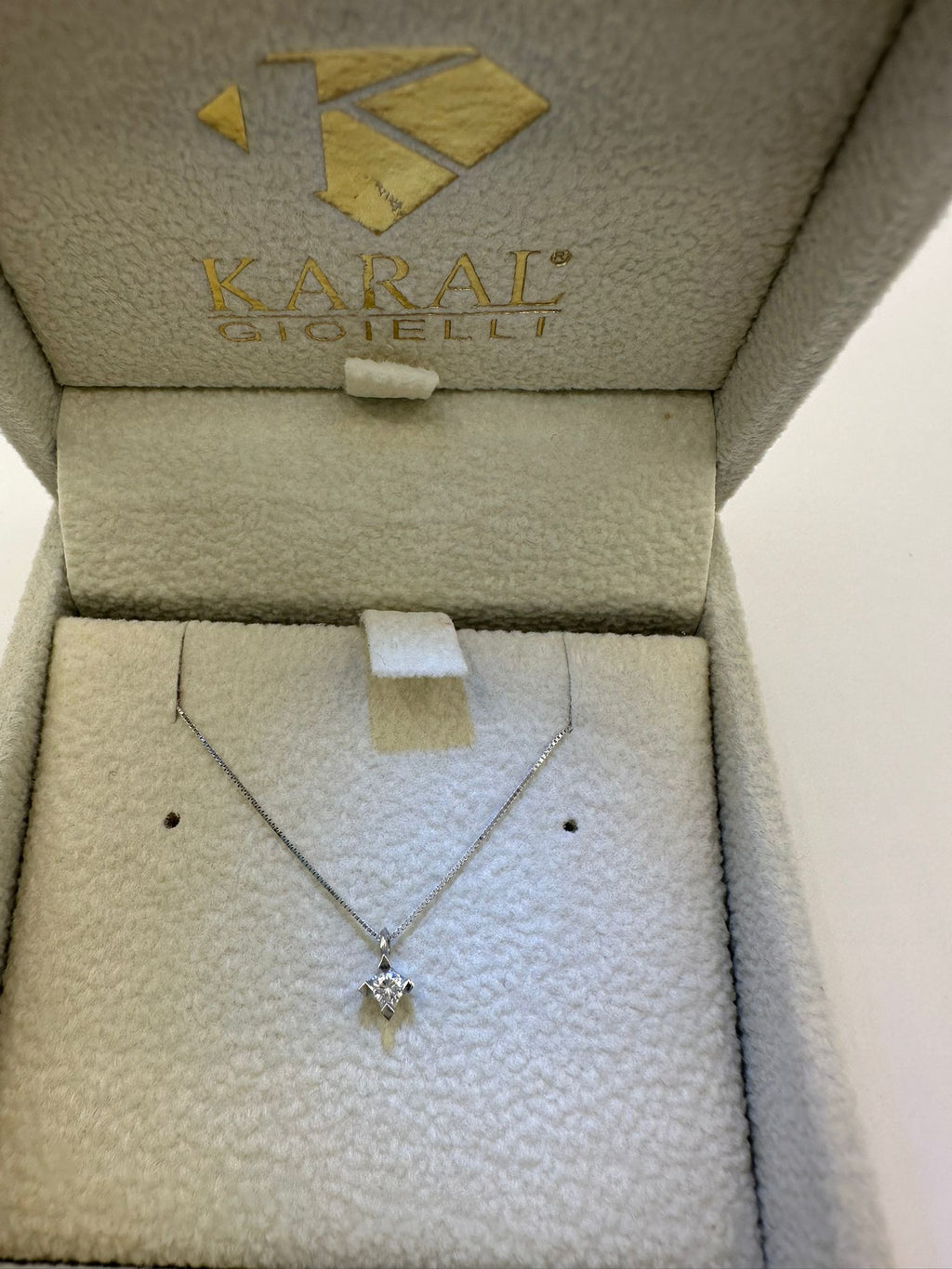 punto luce in oro con diamante - karal