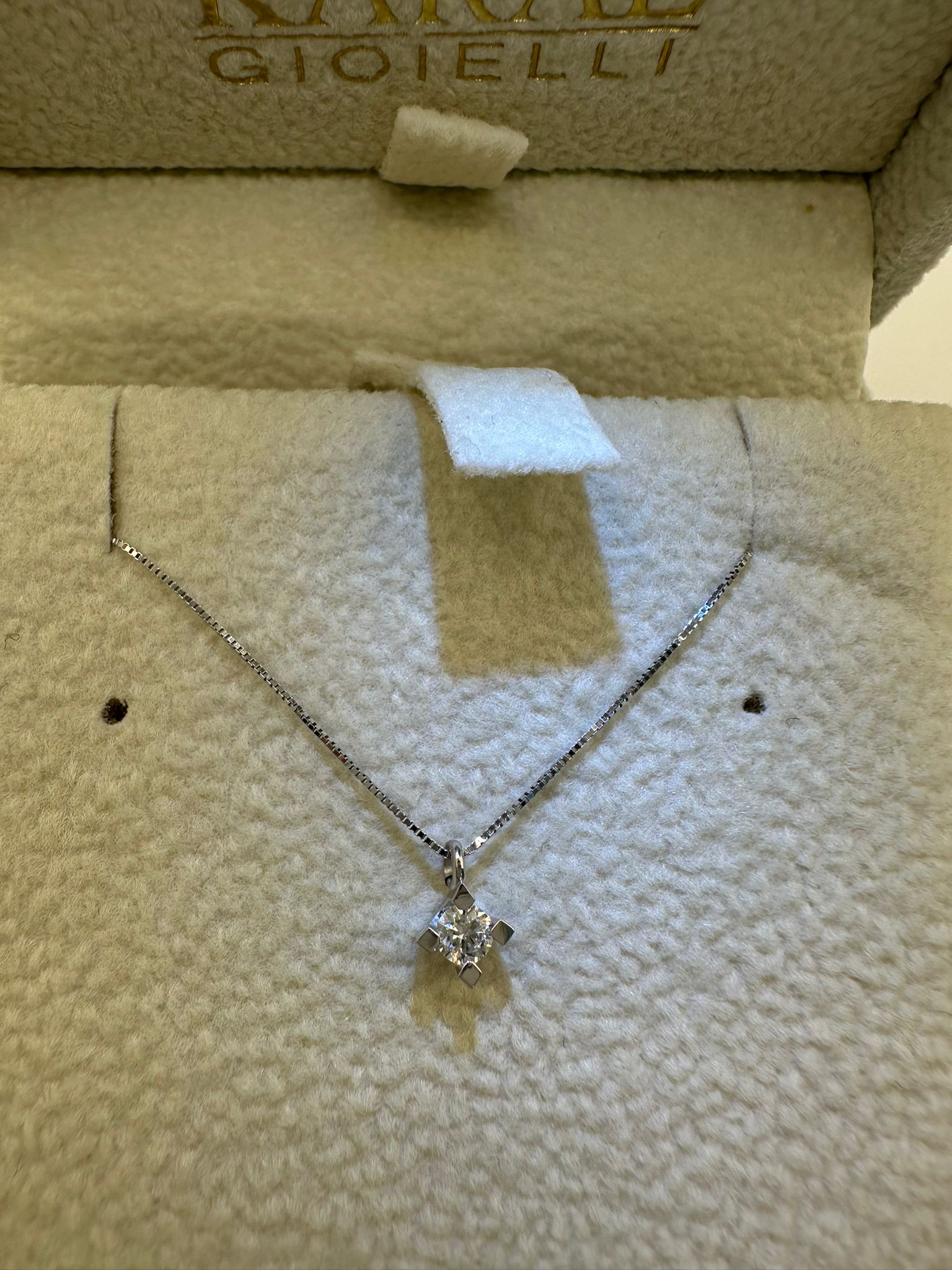 punto luce in oro con diamante - karal