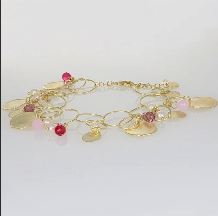 bracciale con charms, perle e pietre fucsia